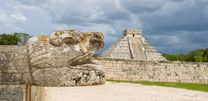 Main Mayan temple. Chichen Itza temple in Cancun, Yucatan area of Mexico. Snakes head and pyramid. Main Mayan temple. Chichen Itza temple in Cancun, Yucatan area of Mexico. Snakes head and pyramid.