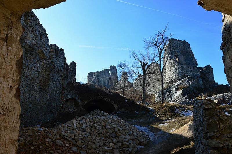 Ruins of castle Gymes, Slovakia, view from St. Ignatius church remains on southeastern palace and half circle residental tower