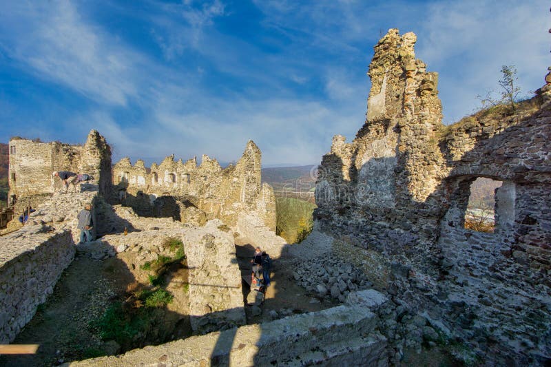 Ruins of hrad Sasov castle near river Hron during autumn