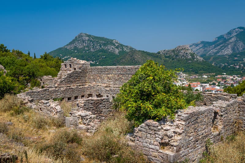 Ruins of medieval fortress with a mountain background royalty free stock images Ruins of medieval fortress with a mountain background royalty free stock images