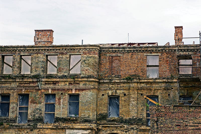 The ruins of the old brick high-rise building