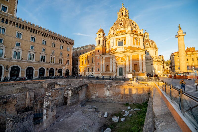 Sunset view on Auditorium di Adriano and Church of Santa Maria di Loreto in Rome. Concept of historical landmarks and travel Italy. Sunset view on Auditorium di Adriano and Church of Santa Maria di Loreto in Rome. Concept of historical landmarks and travel Italy