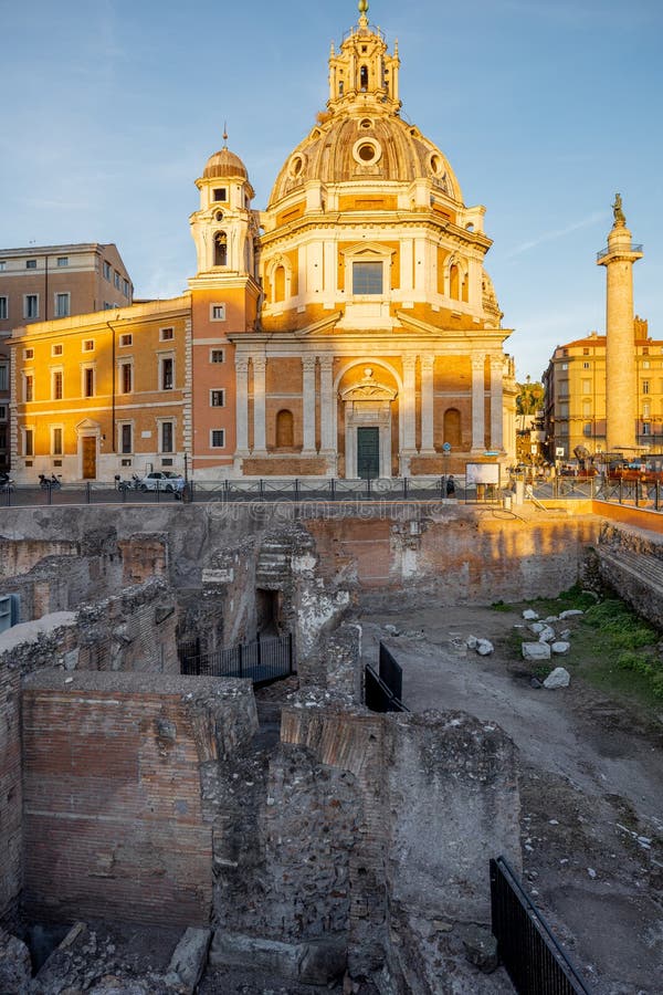 Sunset view on Auditorium di Adriano and Church of Santa Maria di Loreto in Rome. Concept of historical landmarks and travel Italy. Sunset view on Auditorium di Adriano and Church of Santa Maria di Loreto in Rome. Concept of historical landmarks and travel Italy