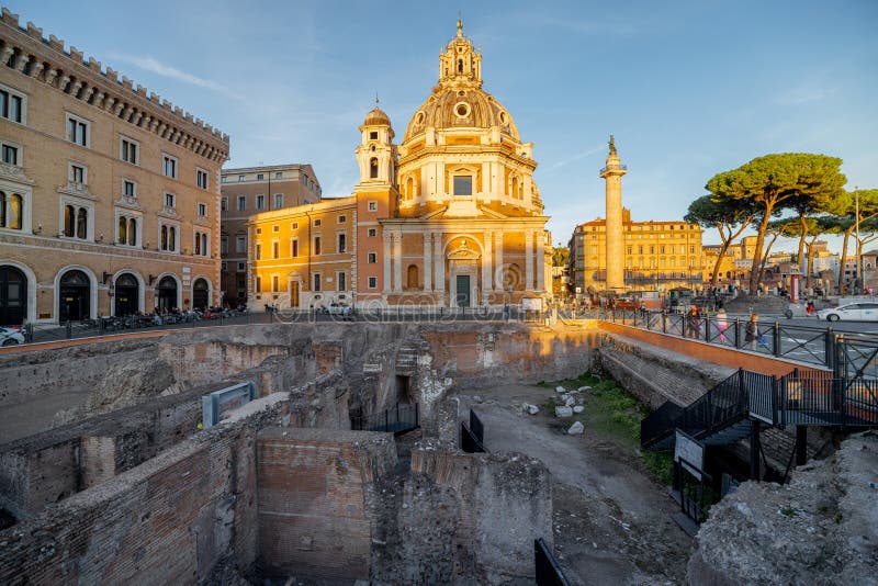 Sunset view on Auditorium di Adriano and Church of Santa Maria di Loreto in Rome. Concept of historical landmarks and travel Italy. Sunset view on Auditorium di Adriano and Church of Santa Maria di Loreto in Rome. Concept of historical landmarks and travel Italy