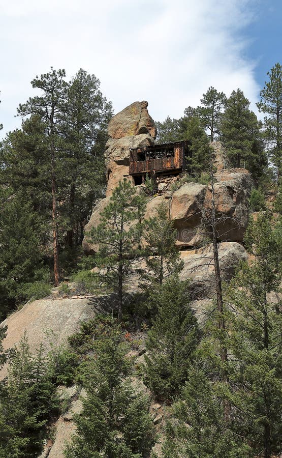 Ruins of a vintage cabin on the rock near Sphinx Park royalty free stock photography