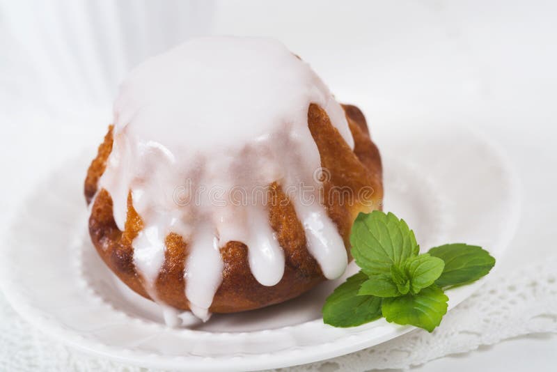 Rum baba cake on plate stock image. Image of glazing 76781449