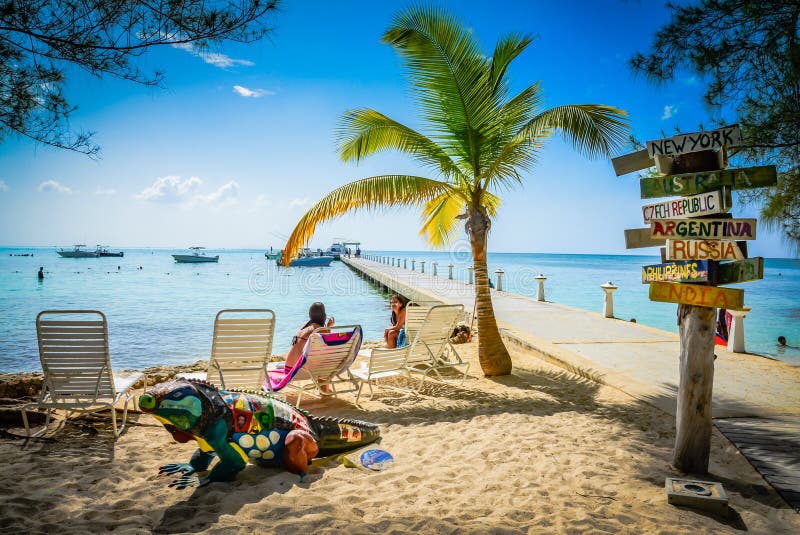 Rum Point Club Beach - Grand Cayman Editorial Image - Image of holiday,  signs: 92783405