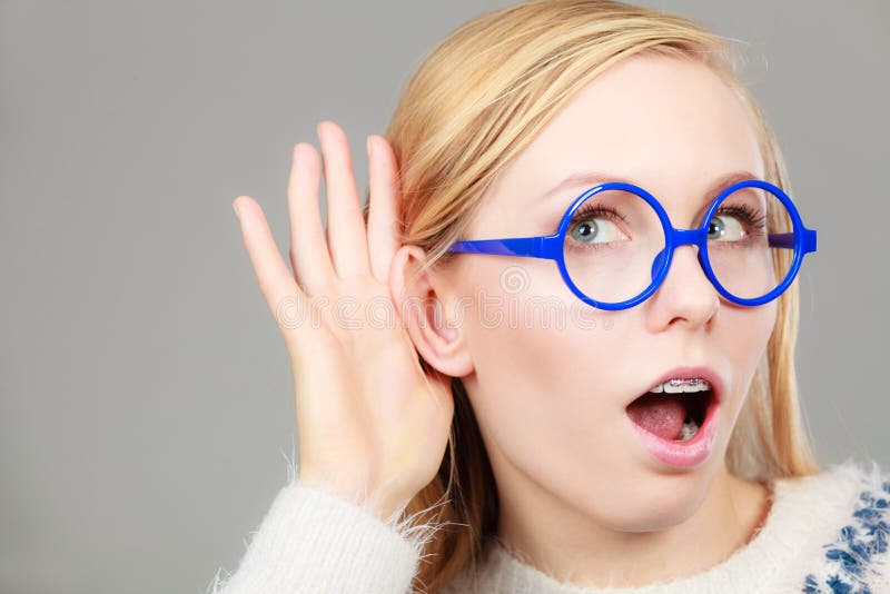 Woman Listening Carefully With Hand Close To Ear Stock Photo Image Of