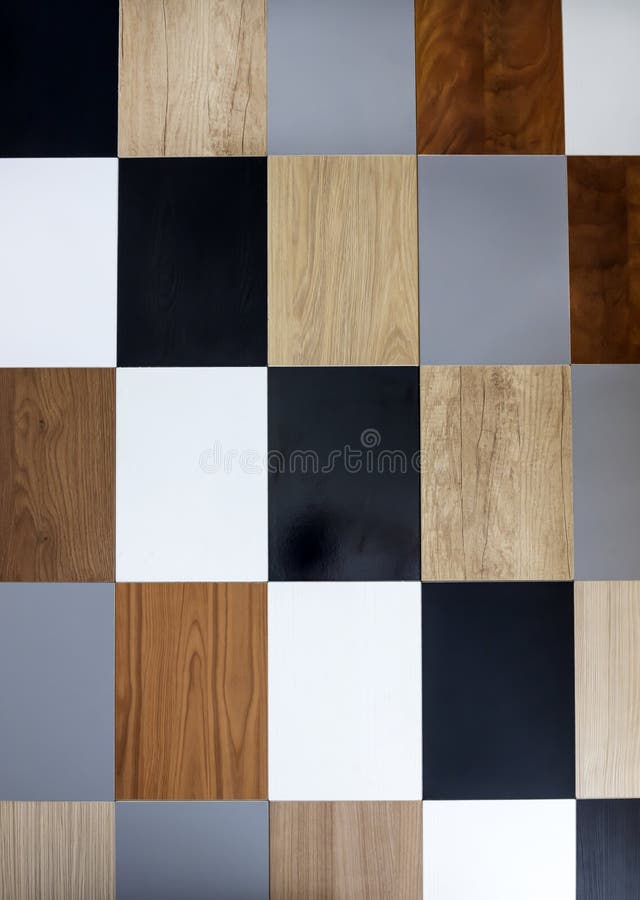 Room design. Wall with abstract multicolored geometric pieces of wood of rectangular size. Room design. Wall with abstract multicolored geometric pieces of wood of rectangular size
