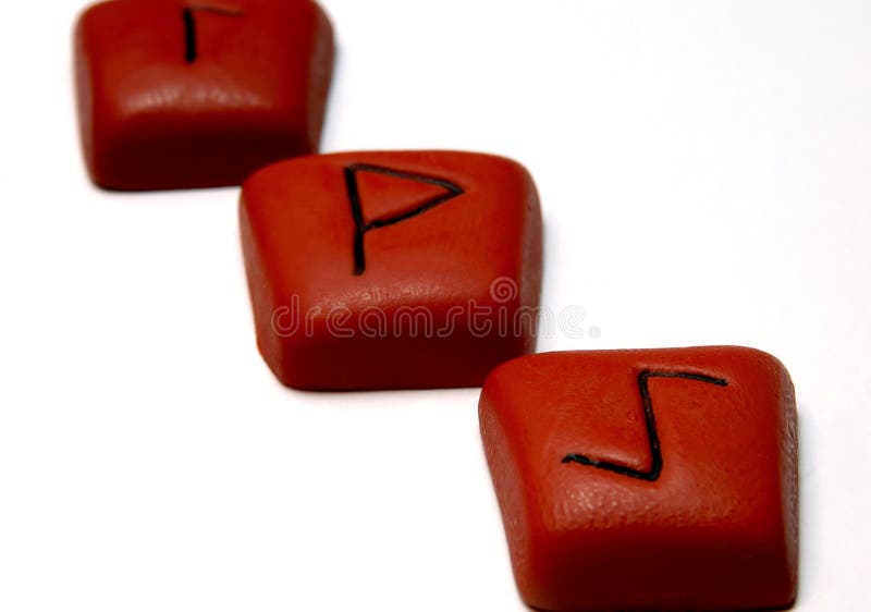 3 runes shot under a bounced flash against white. Ancient pagan celtic images stock images, royalty-free photos and pictures