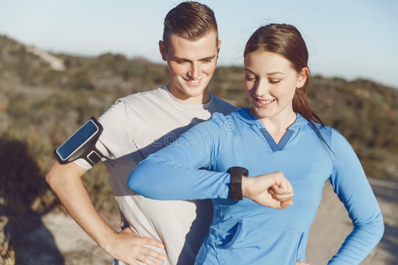 Runner Woman with Heart Rate Monitor Running on Beach Stock Photo - Image of outdoors, male
