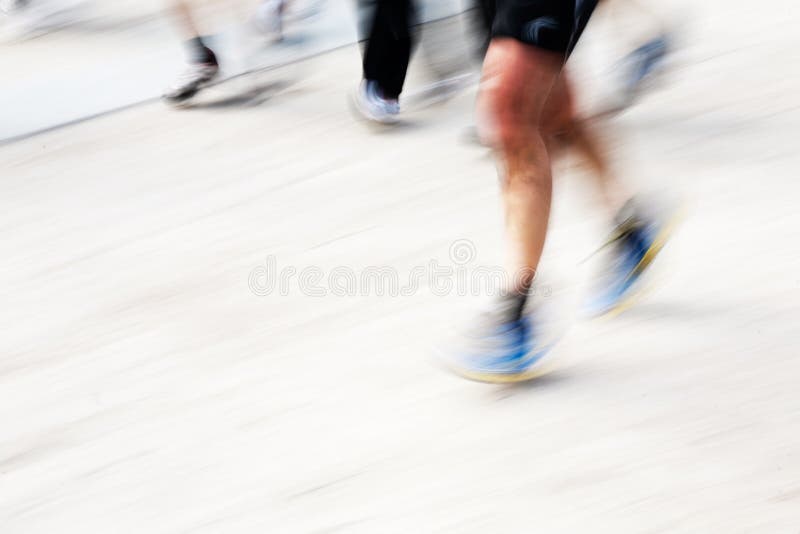 Runners legs with panning blur royalty free stock photography