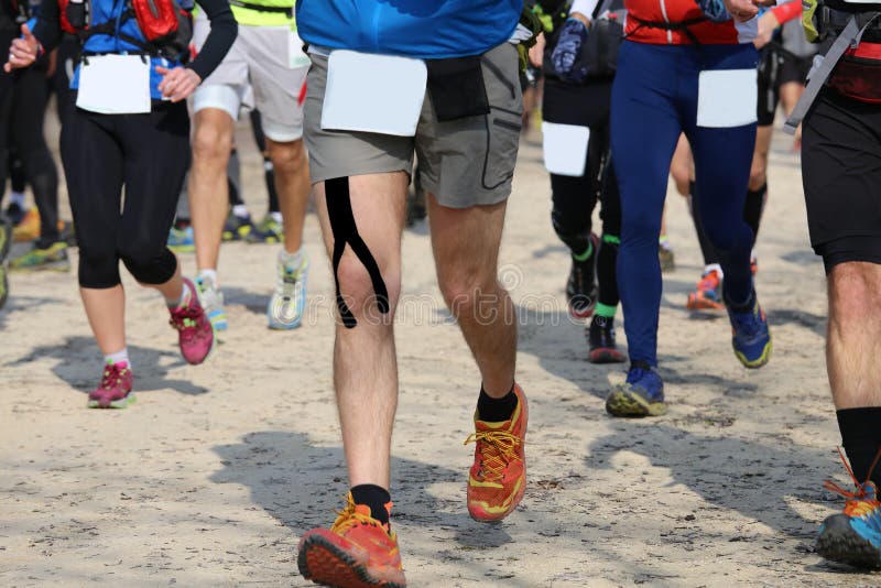 Runners Run on the Road while Riding in a Race Stock Image Image of