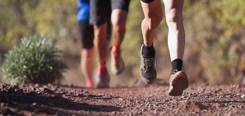 Runners running shoes on trail run