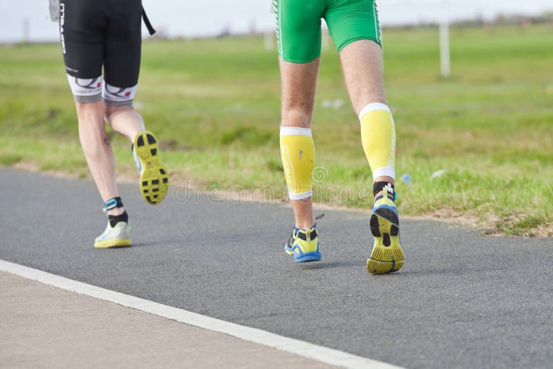 Runners, triathlon editorial photo. Image of ironman 21079491