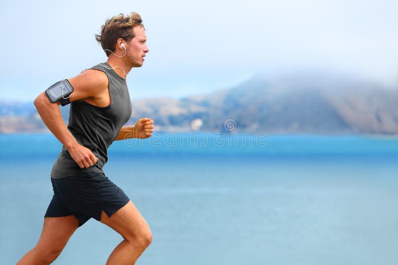 Running App on Smartphone. Male Listening To Music Jogging Armband for Smart Phone Stock Image - Image of healthy, beach: 234098249