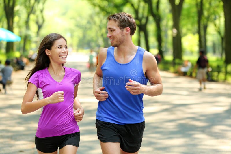 Running couple training in Central Park, New York