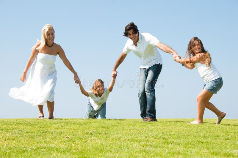 Running family on meadow