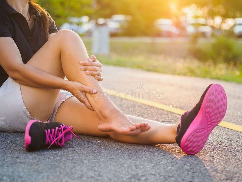 Running injury leg accident- sport woman runner hurting holding.