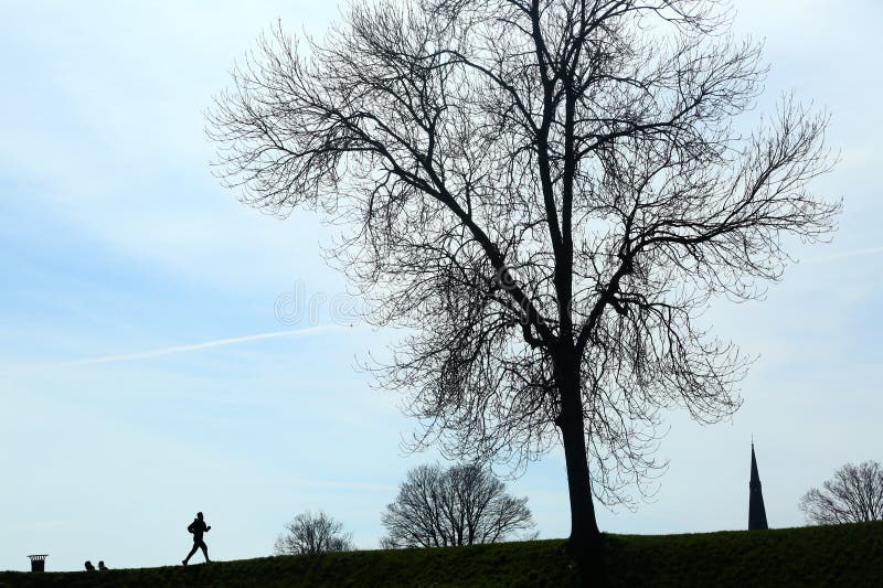 Running person silhouette as activity health care sport stock photo