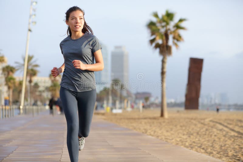 Running woman jogging Barcelona Beach Barceloneta stock images Running woman jogging Barcelona Beach Barceloneta stock images