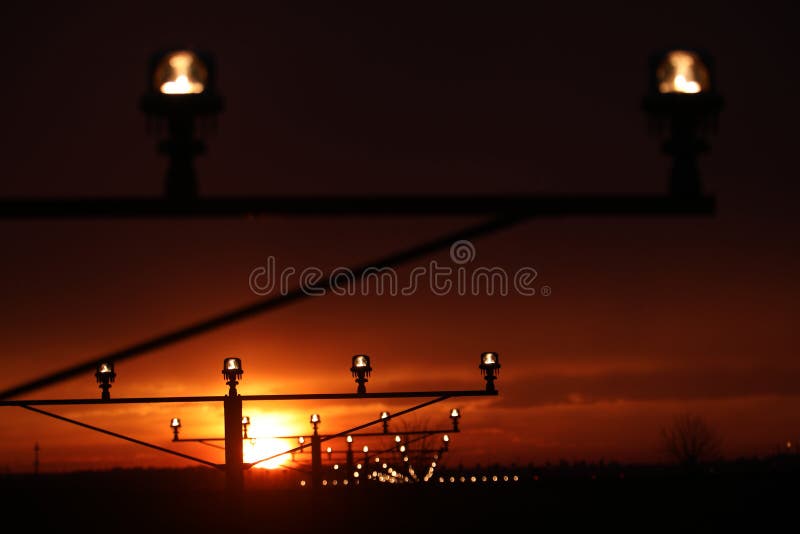 Runway Lights, Orange Sunset Stock Photo - Image of light, evening
