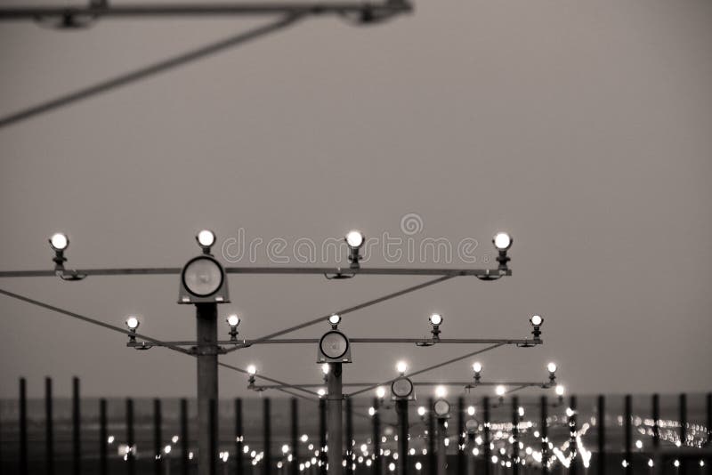 Runway Lights, Orange Sunset Stock Photo - Image of poles, land: 117886910