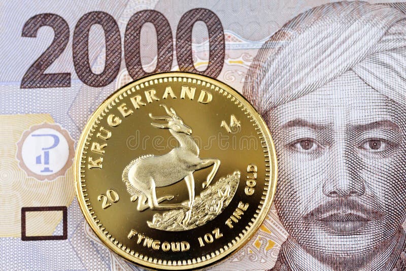 A 2000 Rupiah Indonesian Bank Note with a Gold South African Krugerrand ...