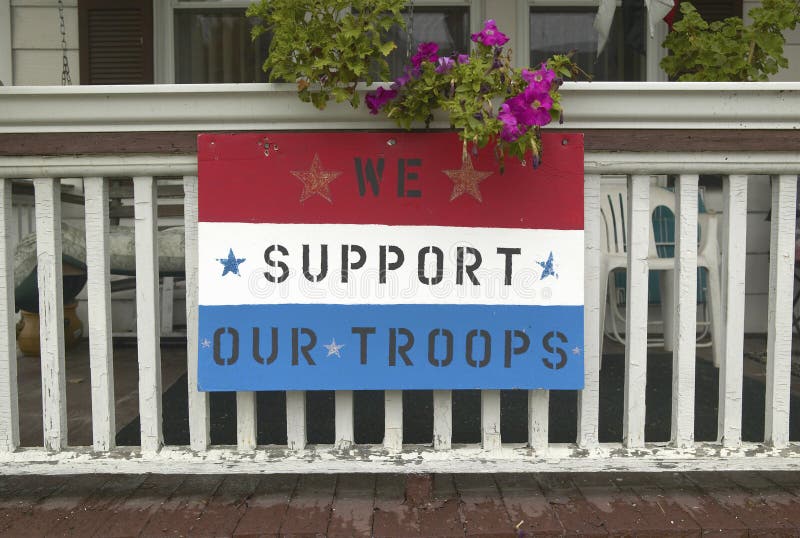 A rural house with We Support Our Troops sign royalty free stock photography