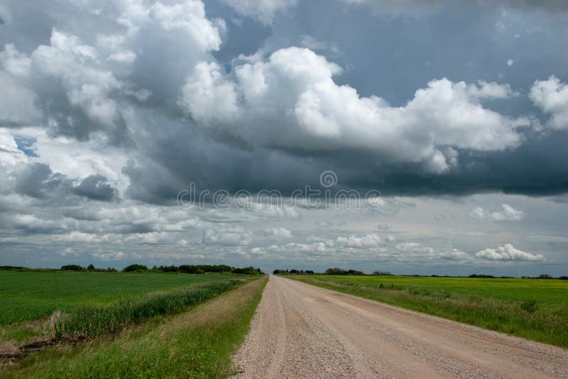 Rural Range Road and Farm Land, Saskatchewan, Canada. Stock Photo
