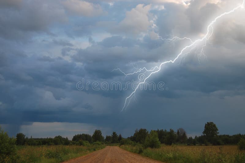 Rural road to storm sky royalty free stock images