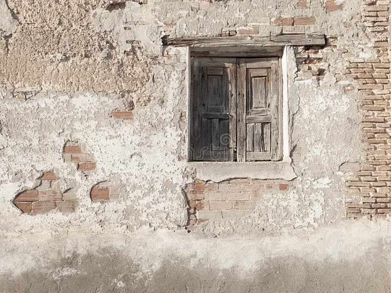 Rural window, spanish architecture, bricks wall and wooden details