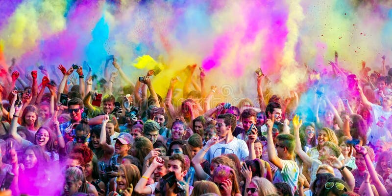 Happy young people dancing and celebrating during Music and Colors festival royalty free stock photo Happy young people dancing and celebrating during Music and Colors festival royalty free stock photo