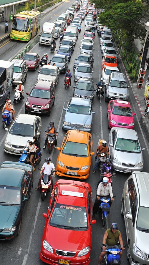 Rush Hour traffic moves slowly along a busy road in Sathorn district on Feb 6, 2013 in Bangkok, Thailand. Annually an estimated 150,000 new cars join the heavily congested roads of the Thai capital.