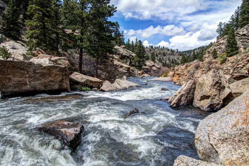 Rushing stream river water through Eleven Mile Canyon Colorado