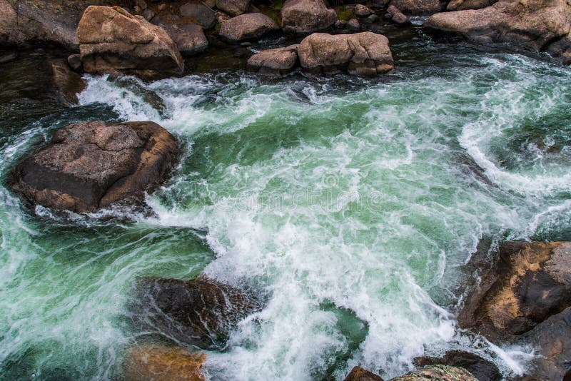 Rushing stream river water through Eleven Mile Canyon Colorado