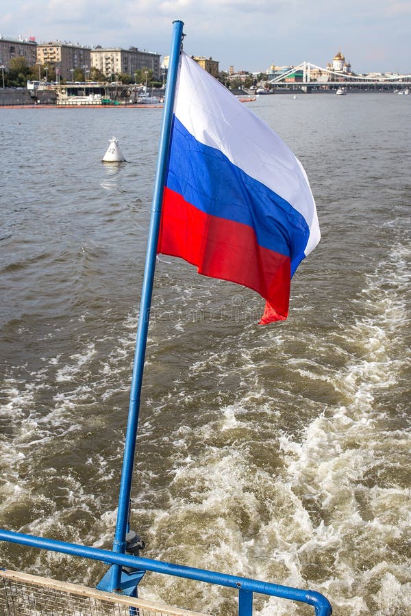 Russia flag and Moskva River and embankments stock photography Russia flag and Moskva River and embankments stock photography