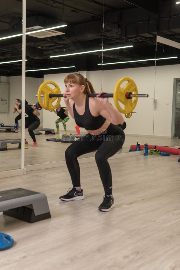 RUSSIA, MOSCOW - FEB 14, 2022: barbell group young size athlete, for body sport from healthy from lifestyle training stock photography RUSSIA, MOSCOW - FEB 14, 2022: barbell group young size athlete, for body sport from healthy from lifestyle training stock photography
