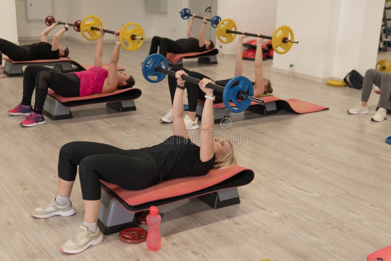 RUSSIA, MOSCOW - FEB 14, 2022: barbell group young plus strong, for body sport for fit for lifestyle person, lus royalty free stock image RUSSIA, MOSCOW - FEB 14, 2022: barbell group young plus strong, for body sport for fit for lifestyle person, lus royalty free stock image