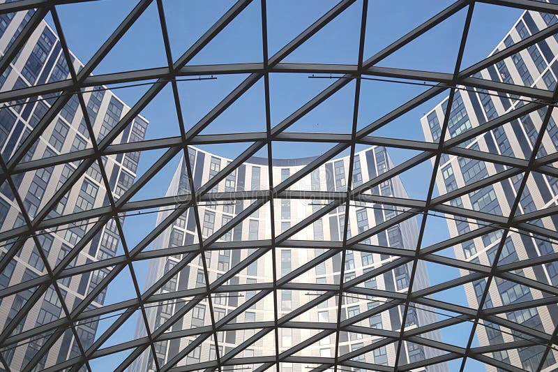 Russia, Moscow, 14.09.2019: View from below through a spherical transparent roof to a modern residential complex.