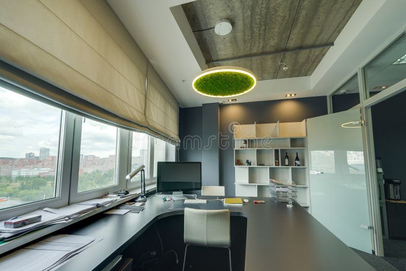 Russia, Novosibirsk - August 28, 2018: decorative moss for interior decoration. office style, interior design