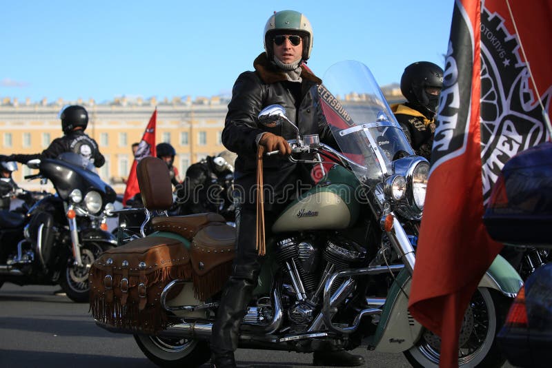 Russian actor Alexander Ustyugov on his Indian Chief Vintage motorcycle among other bikers royalty free stock photography Russian actor Alexander Ustyugov on his Indian Chief Vintage motorcycle among other bikers royalty free stock photography