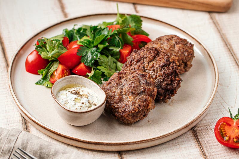Russian Beef Cutlets with Sauce and Salad Stock Image Image of