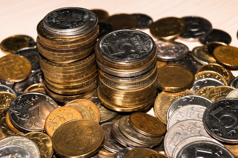 Russian Coins of Different Denominations are in a Heap on the Table