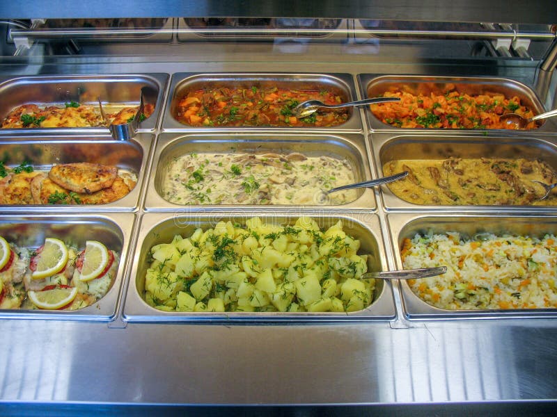 Rows of Trays with Fresh Ready Food in a Russian Cuisine Canteen Stock