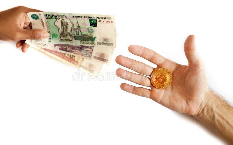 Russian money and bitcoin in the hand of people royalty free stock photos Russian money and bitcoin in the hand of people royalty free stock photos