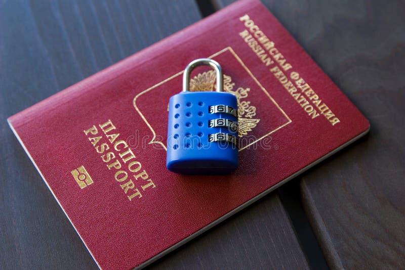 Russian passport locked to padlock. Symbol of anti-Russian sanctions royalty free stock photos Russian passport locked to padlock. Symbol of anti-Russian sanctions royalty free stock photos