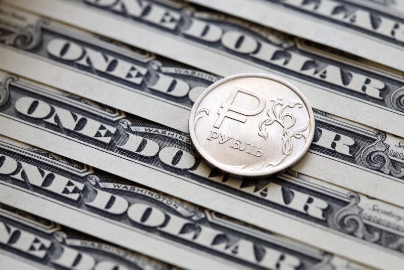 Russian Ruble Coin on One Dollar Bills Background Stock Photo Image