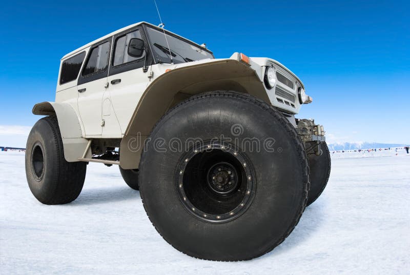 Off road vehicle at winter frozen Baikal. Off road vehicle at winter frozen Baikal