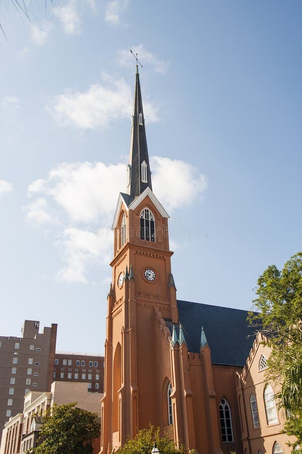 Rust Colored Church Steeple on Nice Sky